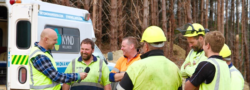 Dr Tom Mulholland Testing Forstry Workers During Work Wellness Tour